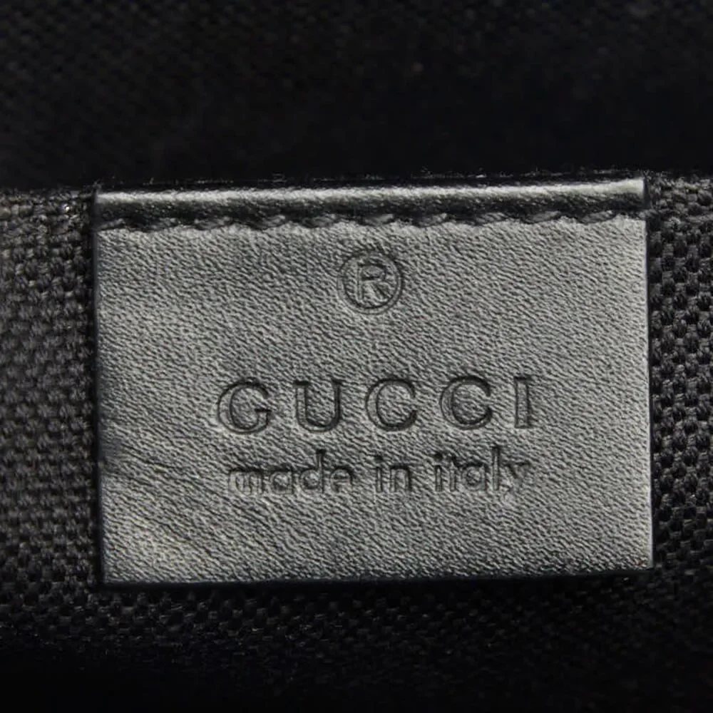 Gucci GG Supreme Clutch Bag